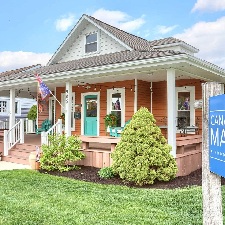 Exterior entrance of Canal Street Market in Winona Lake, IN.