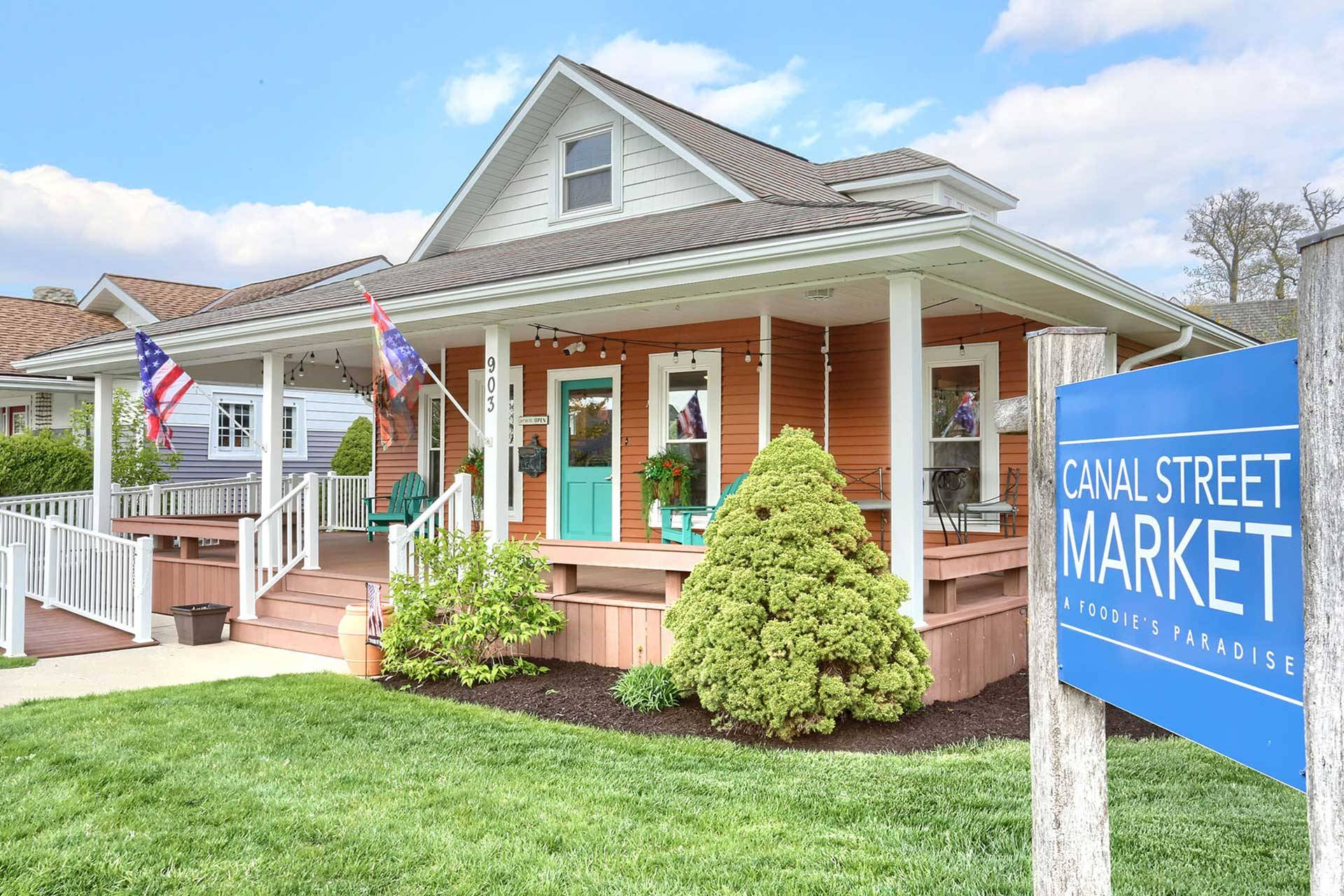 Exterior entrance of Canal Street Market in Winona Lake, IN.